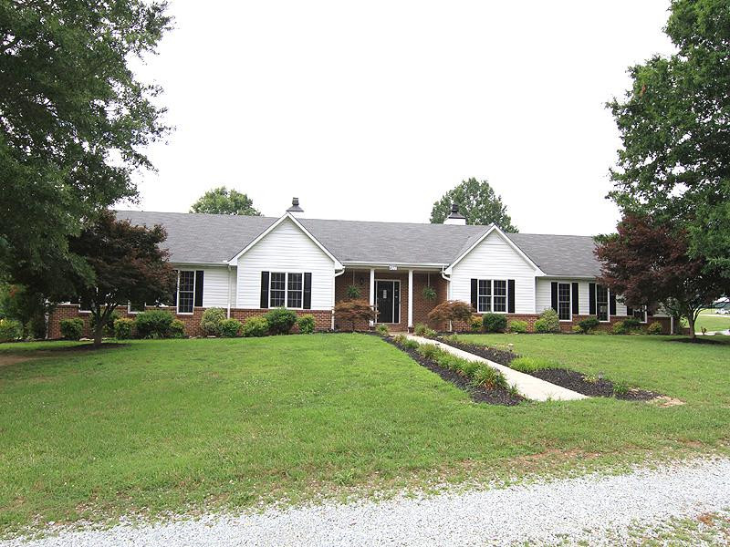 407 County Line Road Timberlake, NC 27583 - Photo 1 of 21 4250 square feet of living area with huge rooms, all on one level. Facade/Exterior Front