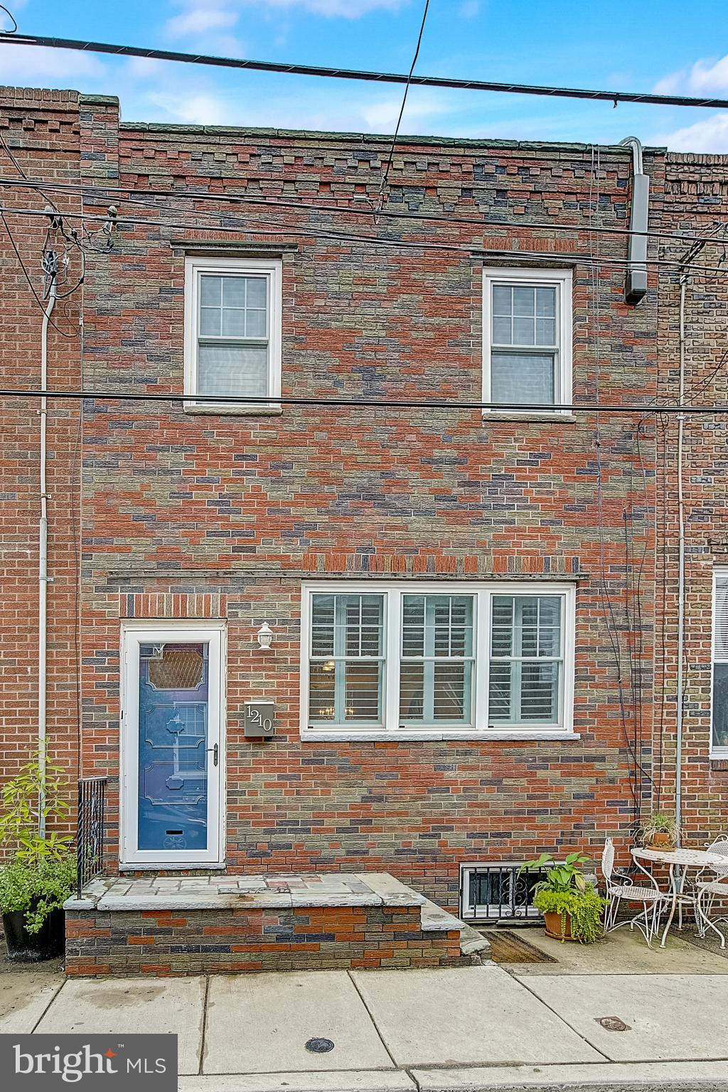 a brick building with a window