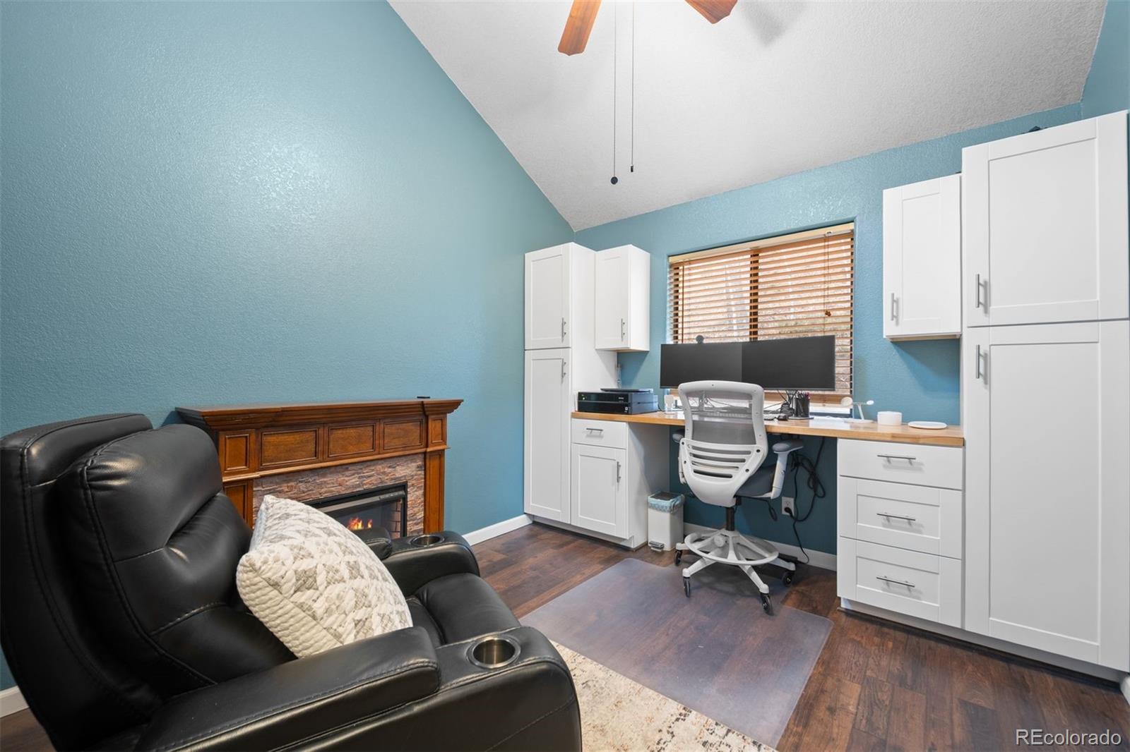 609 Gold Flake Terrace Bailey, CO 80421 - Photo 19 of 47 a view of a workspace with furniture and a window