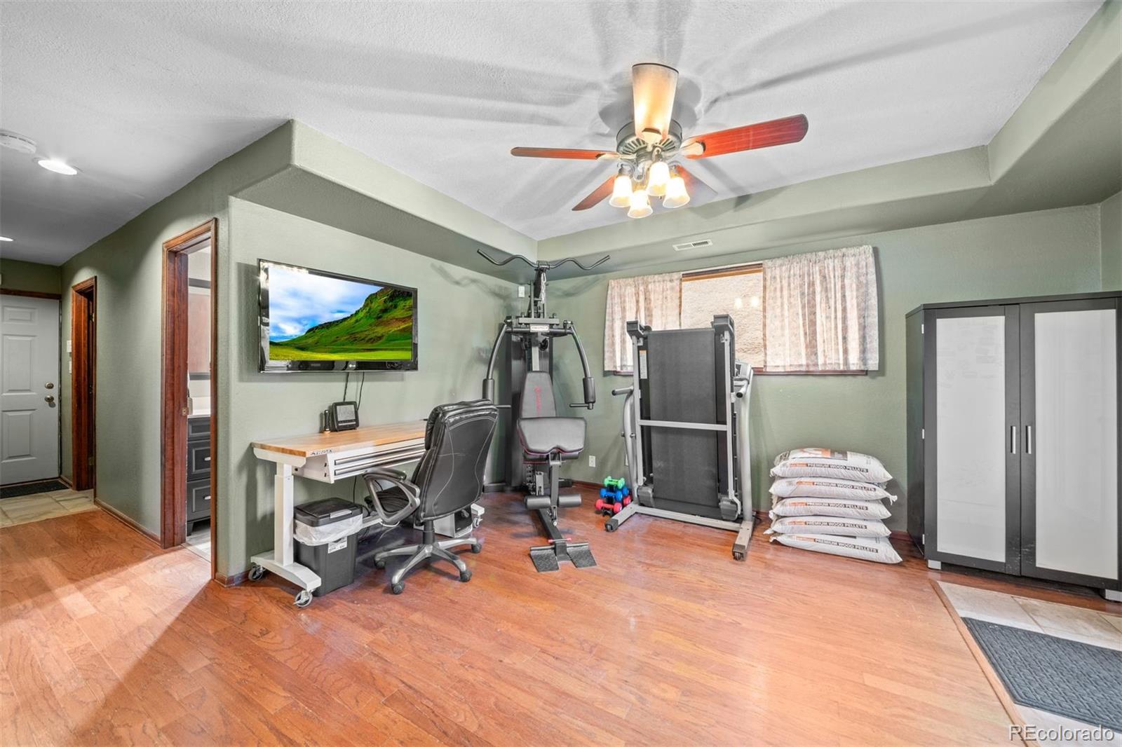 609 Gold Flake Terrace Bailey, CO 80421 - Photo 23 of 47 a view of a livingroom with workspace and a window