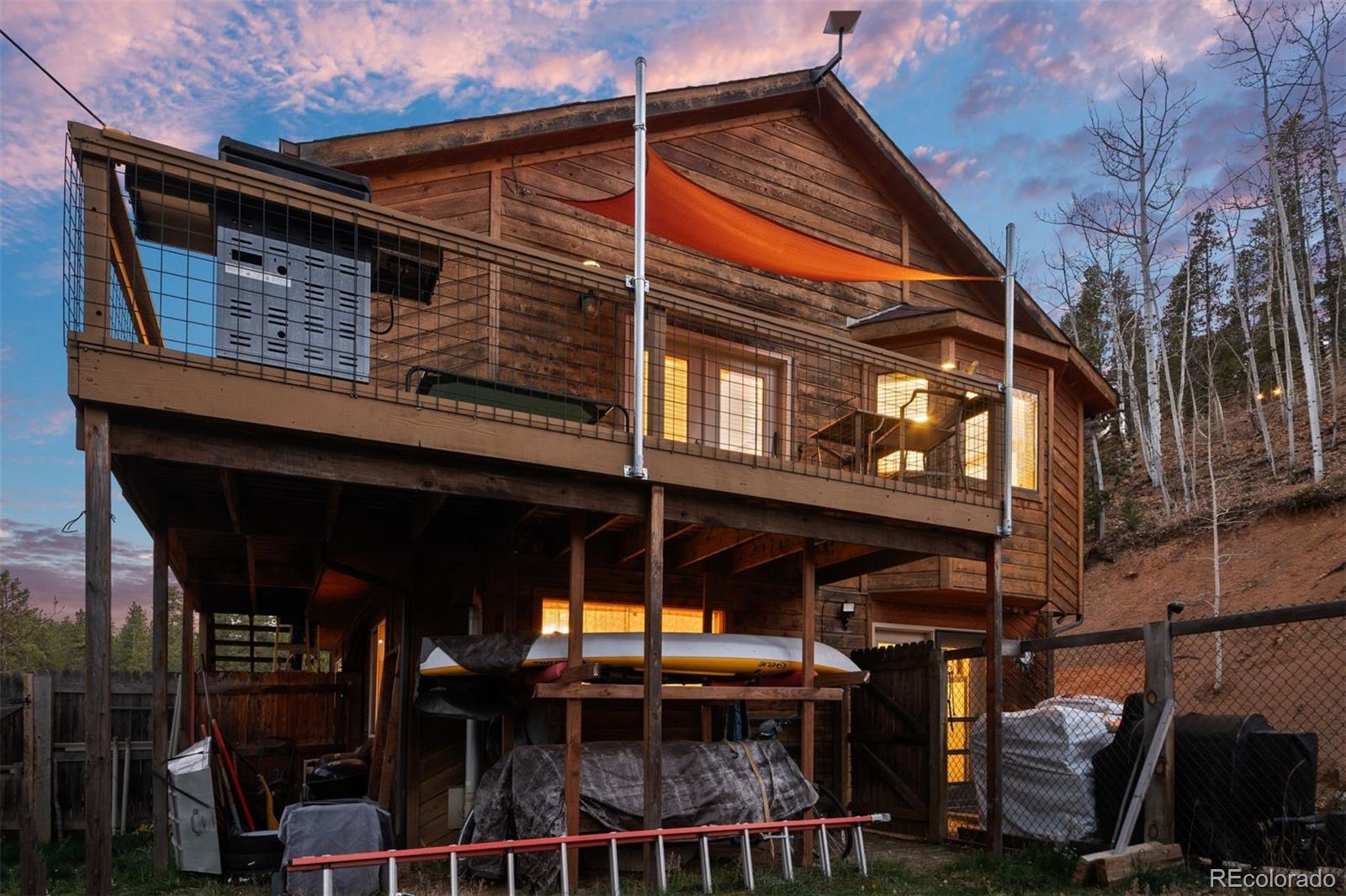 609 Gold Flake Terrace Bailey, CO 80421 - Photo 31 of 47 a view of a house with balcony