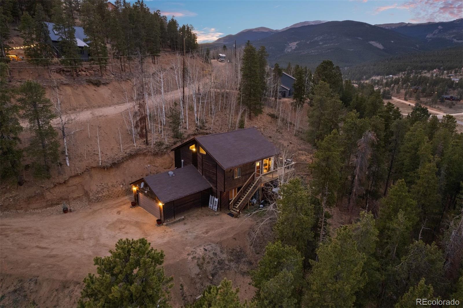 609 Gold Flake Terrace Bailey, CO 80421 - Photo 47 of 47 a view of a terrace with a yard
