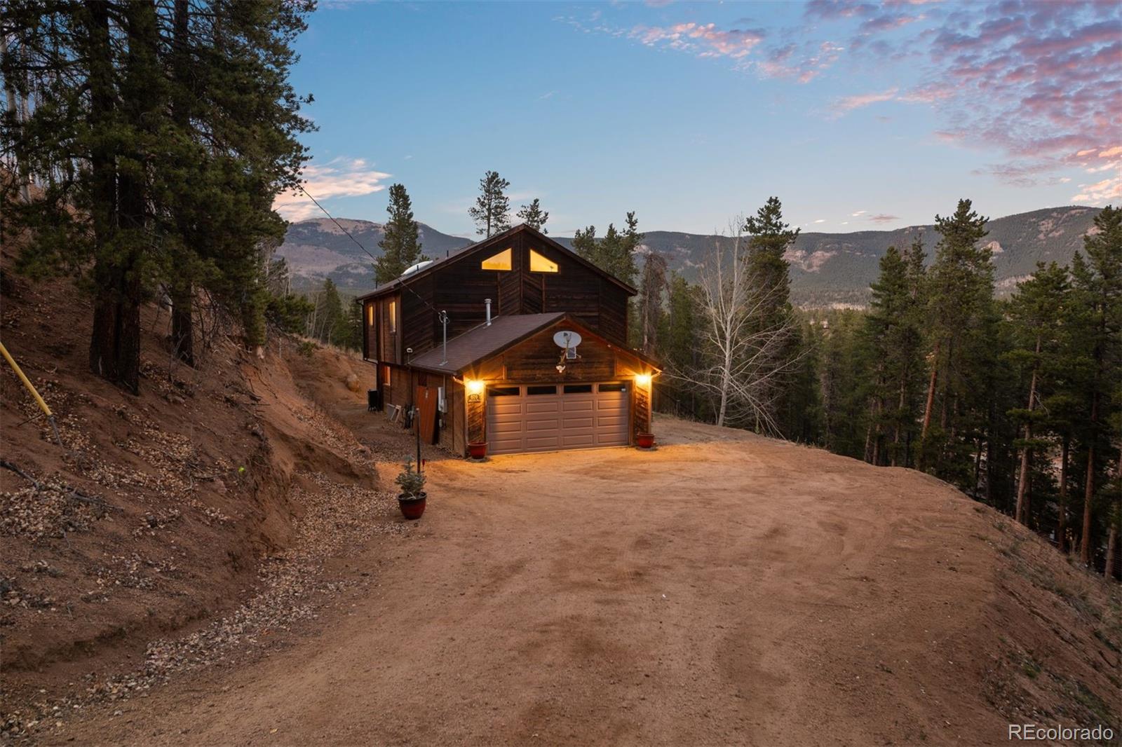 609 Gold Flake Terrace Bailey, CO 80421 - Photo 8 of 47 a park view covered with tall trees