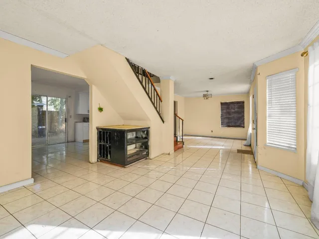 a view of a livingroom with wooden floor