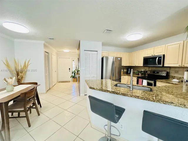 $422,000 | 8952 Northwest 38th Drive, Coral Springs, FL 33065