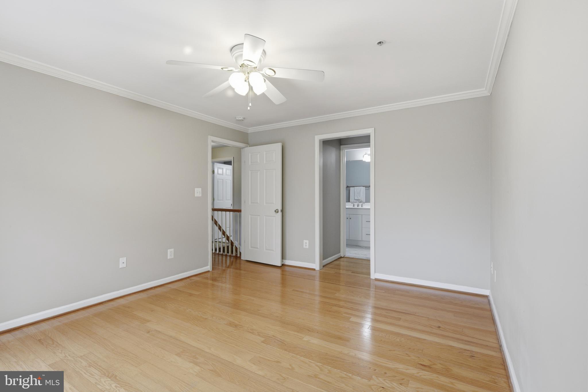 1934 Crescent Park Drive, Unit 28A Reston, VA 20190 - Photo 17 of 38 a view of an empty room with wooden floor
