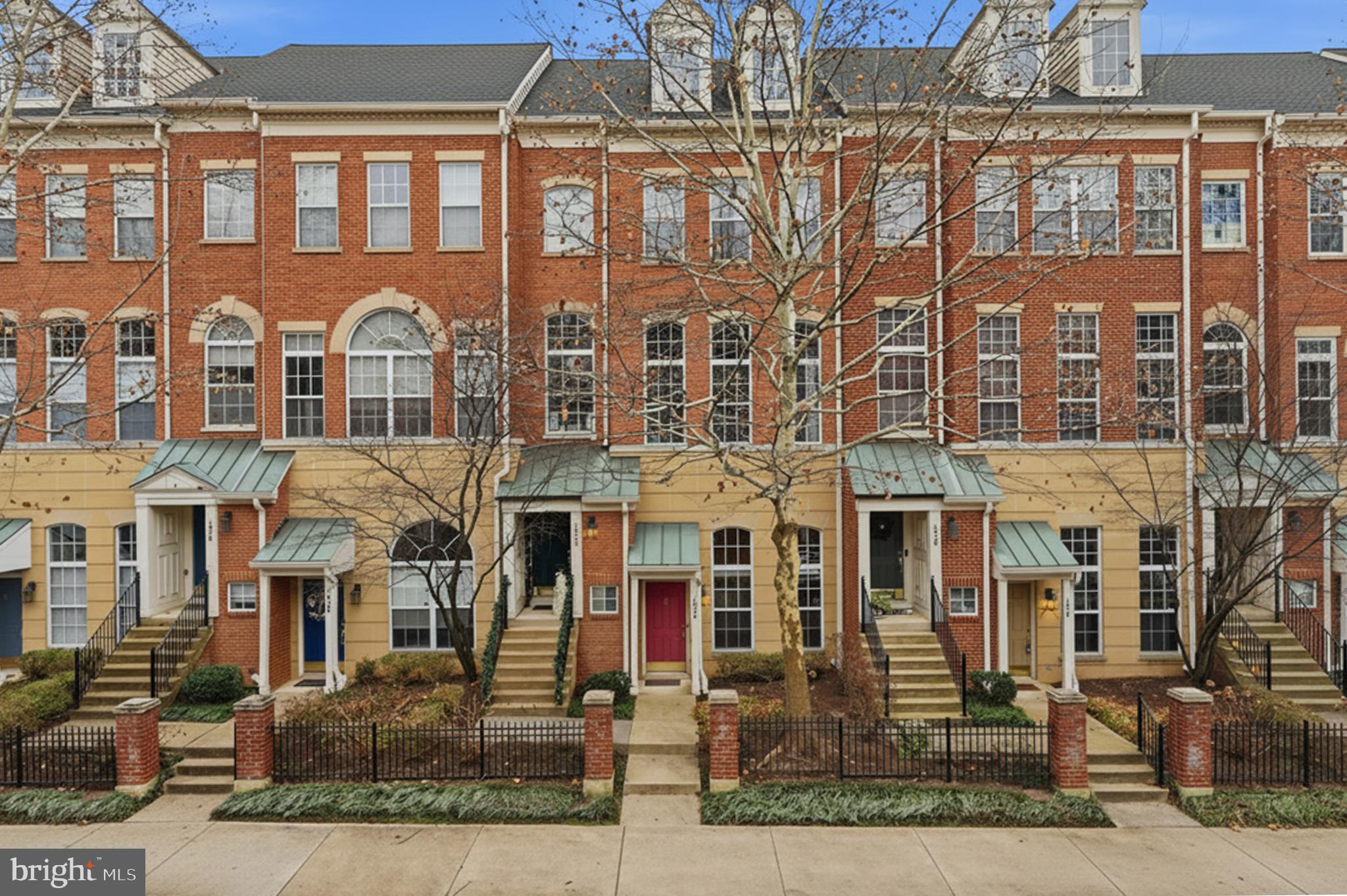 1934 Crescent Park Drive, Unit 28A Reston, VA 20190 - Photo 2 of 38 front view of a brick building