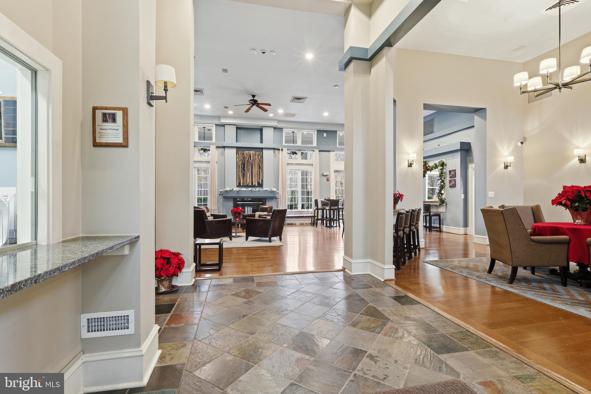 1934 Crescent Park Drive, Unit 28A Reston, VA 20190 - Photo 28 of 38 a view of a living room and dining room