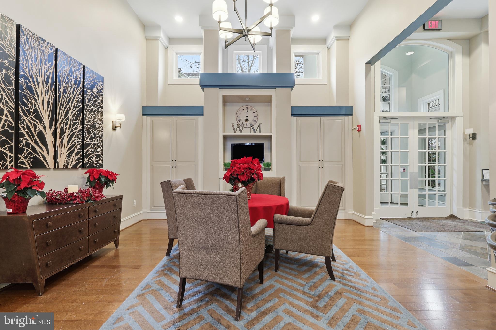 1934 Crescent Park Drive, Unit 28A Reston, VA 20190 - Photo 31 of 38 a living room with furniture fireplace and wooden floor