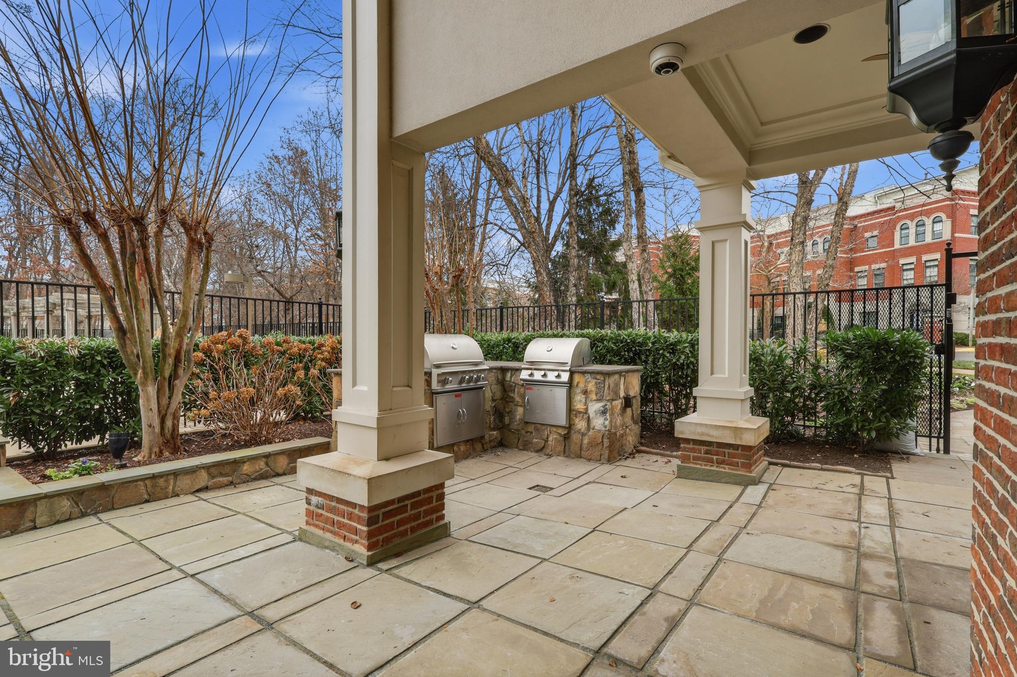 1934 Crescent Park Drive, Unit 28A Reston, VA 20190 - Photo 35 of 38 a white bench sitting in front of a building