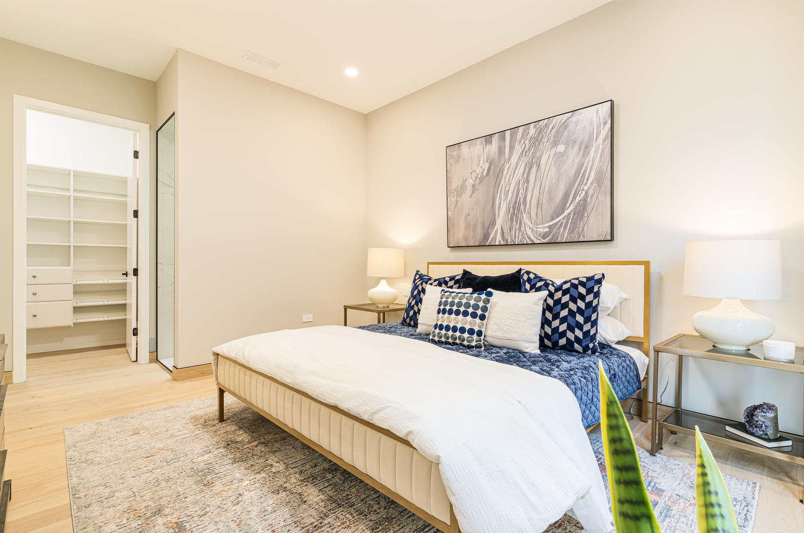 2024 West Irving Park Road, Unit 304 Chicago, IL 60618 - Photo 12 of 12 a bedroom with a bed and a view of bathroom