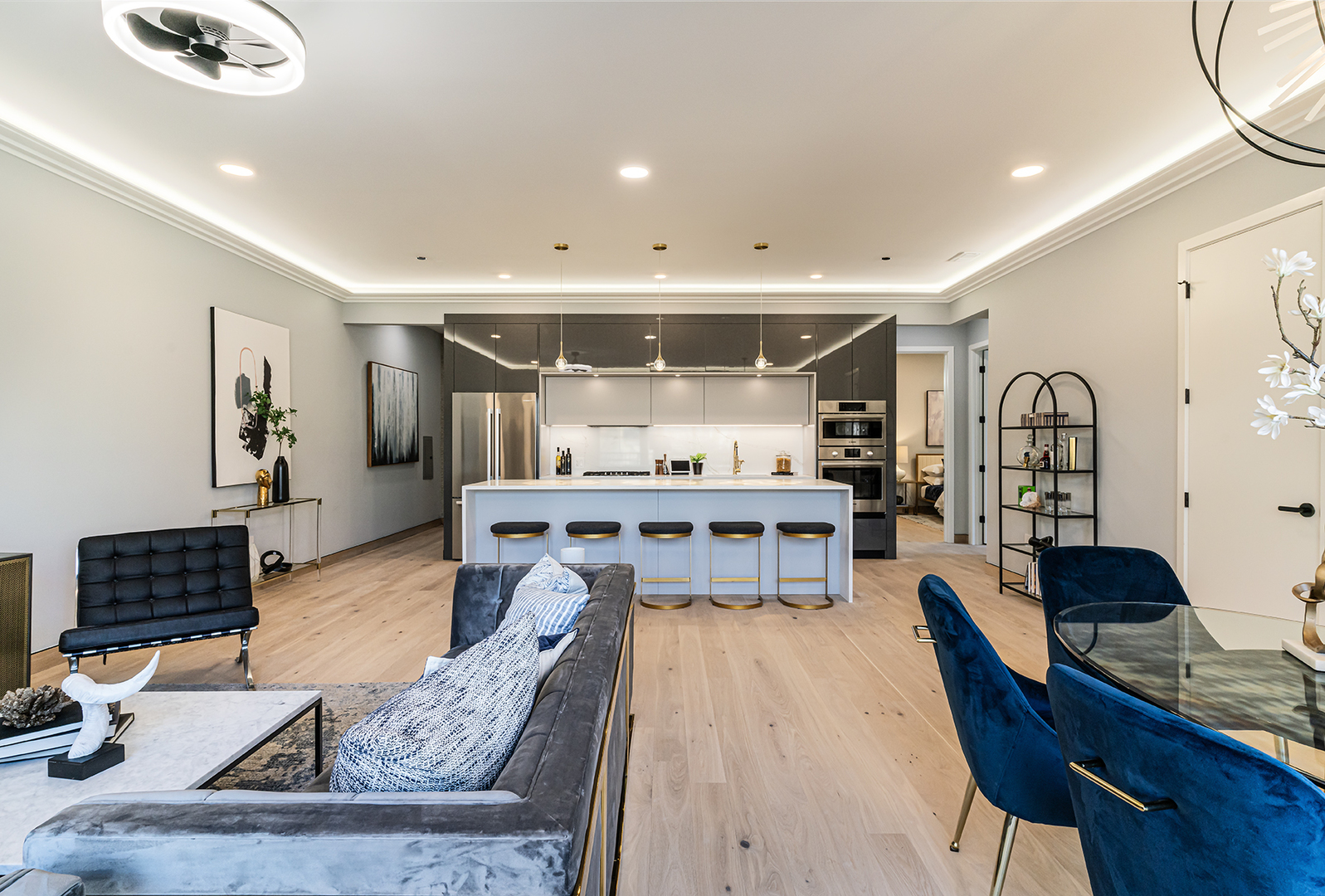 2024 West Irving Park Road, Unit 304 Chicago, IL 60618 - Photo 5 of 12 a living room with furniture a rug and a flat screen tv