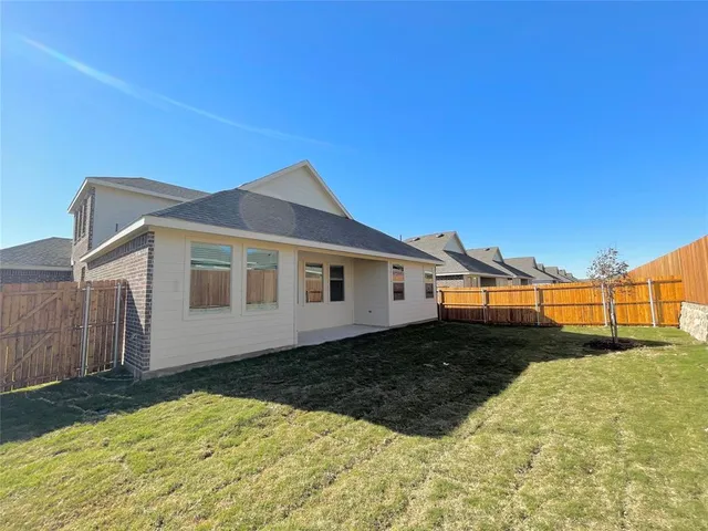 a view of a house with a garage
