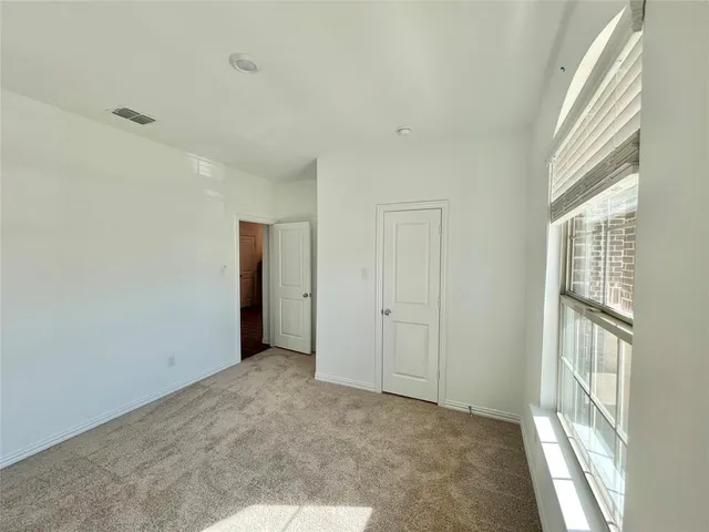 an empty room with a window