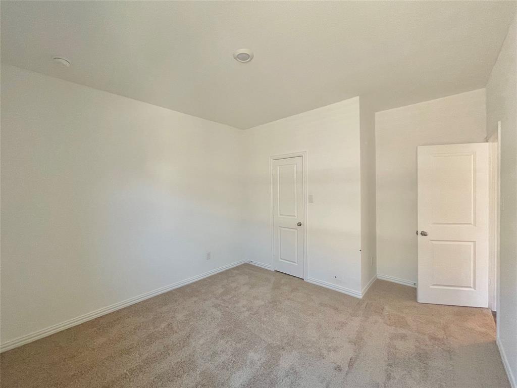 768 Hawthorn Street Princeton, TX 75407 - Photo 9 of 23 a view of an empty room