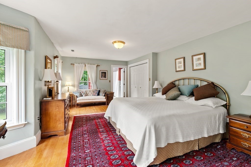 126 Chapman Street Canton, MA 02021 - Photo 21 of 42 a bedroom with a bed and a couch