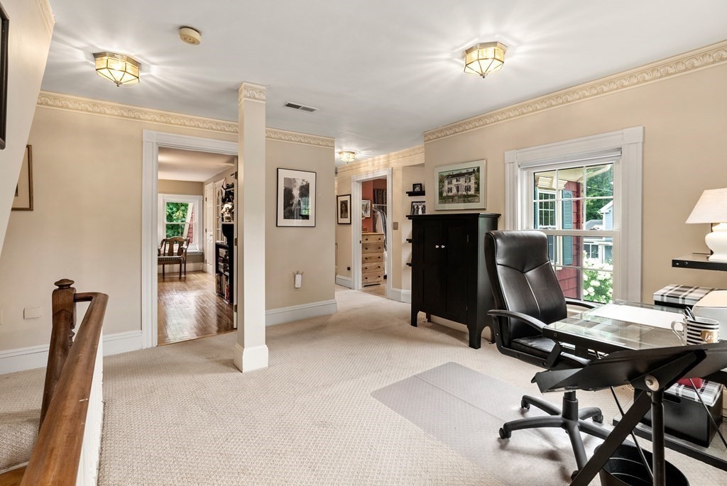 126 Chapman Street Canton, MA 02021 - Photo 28 of 42 a view of a livingroom with workspace and a couch