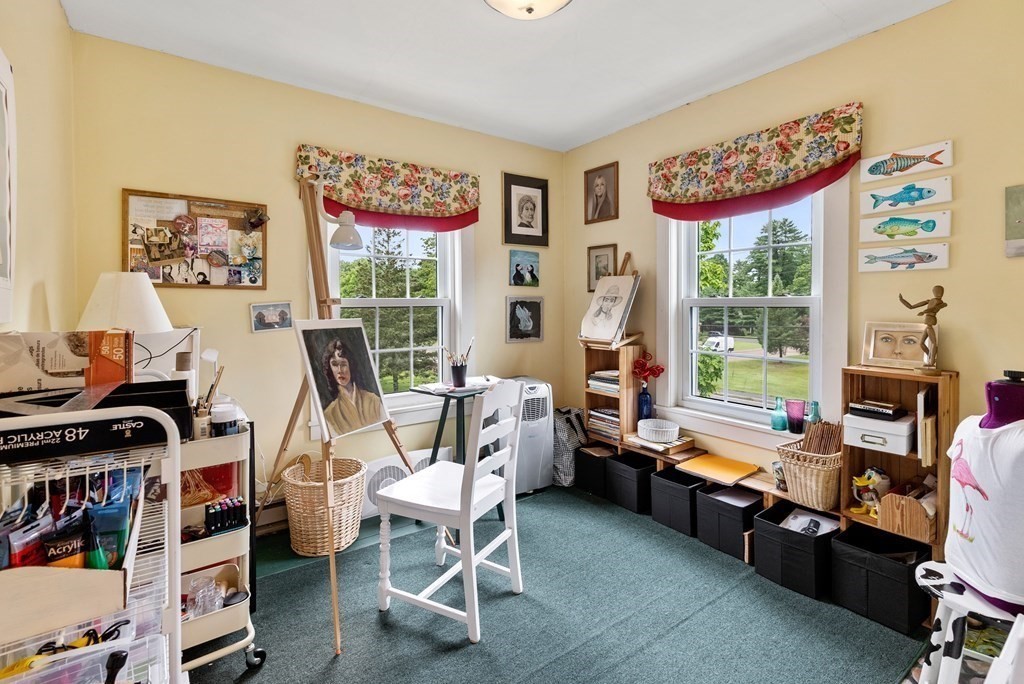 126 Chapman Street Canton, MA 02021 - Photo 30 of 42 a bedroom with furniture and a window