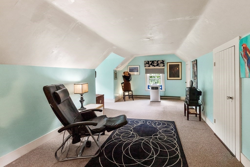 126 Chapman Street Canton, MA 02021 - Photo 31 of 42 a bedroom with furniture and a wooden floor