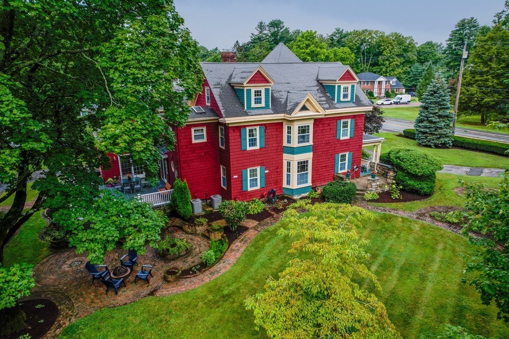 126 Chapman Street Canton, MA 02021 - Photo 41 of 42 a front view of a residential apartment building with a yard