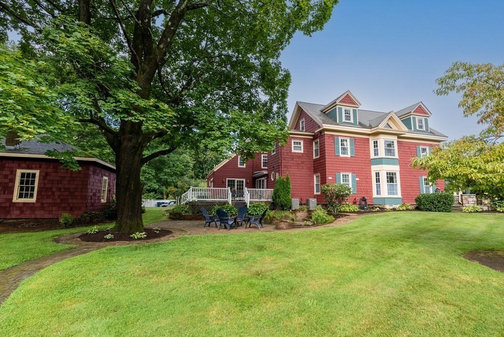 126 Chapman Street Canton, MA 02021 - Photo 42 of 42 a front view of a house with garden