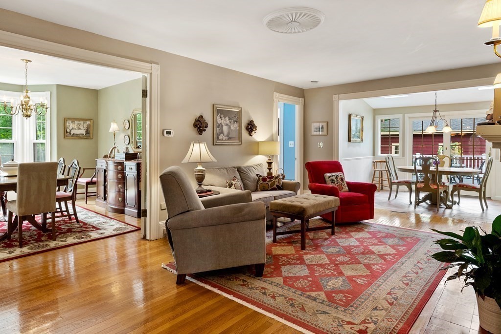 126 Chapman Street Canton, MA 02021 - Photo 6 of 42 a living room with furniture and a wooden floor