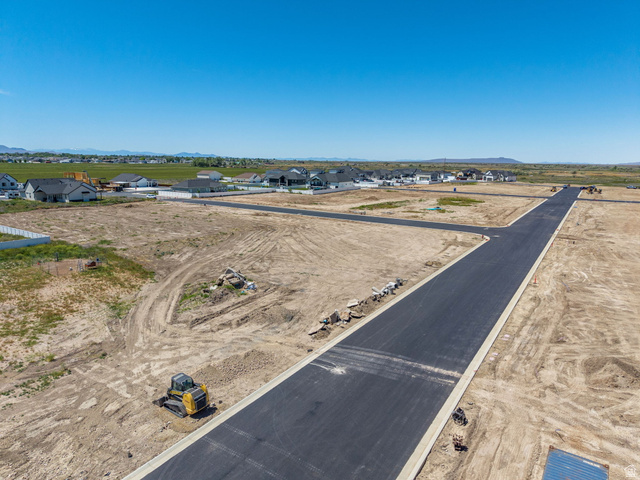 3150 South 5250 West, Unit 210 Hooper, UT 84315 - Photo 6 of 11 New residential development featuring paved roads and visible curb lines