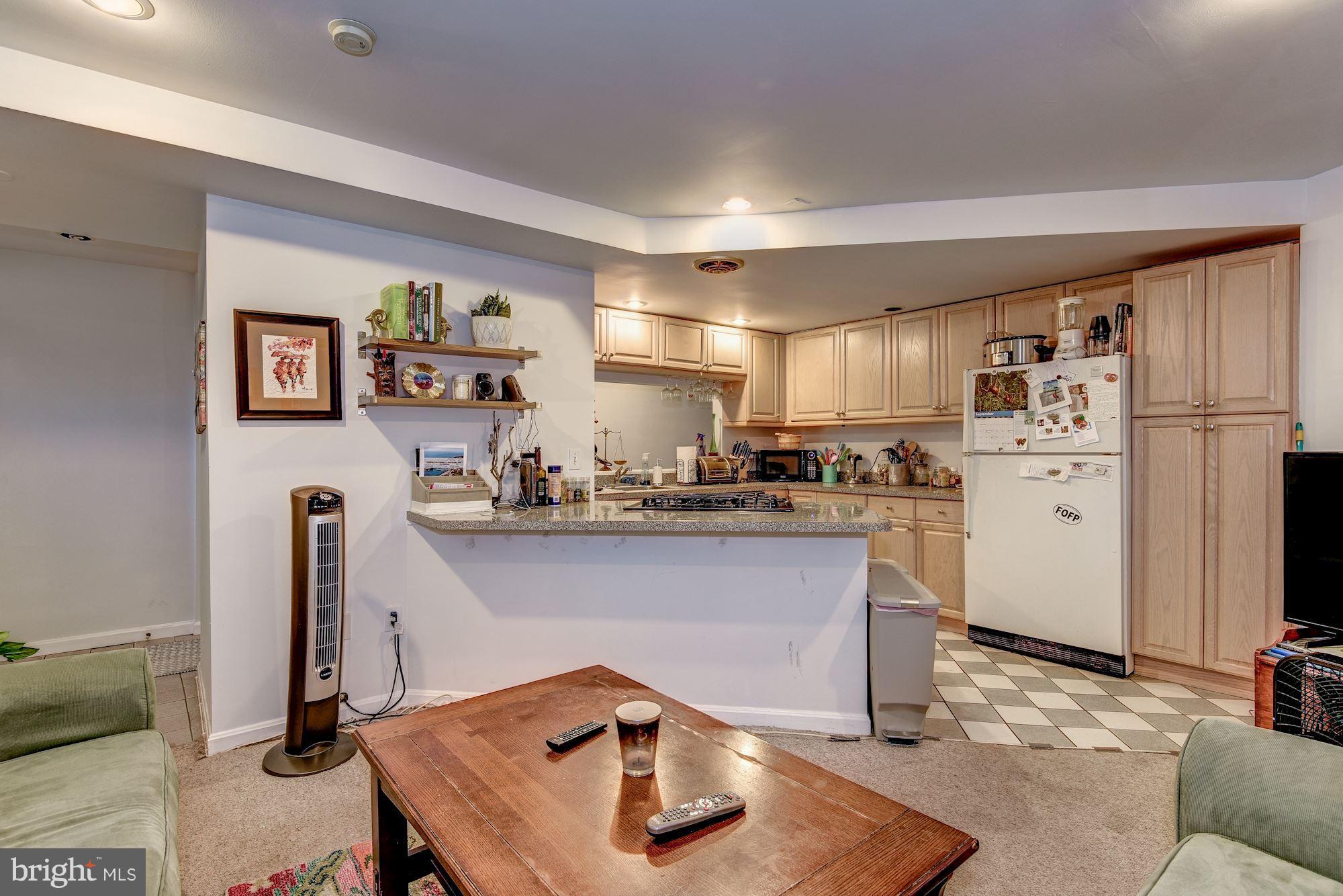 1905 16th Street Northwest Washington, DC 20009 - Photo 21 of 23 Lower Level Living Room & Kitchen