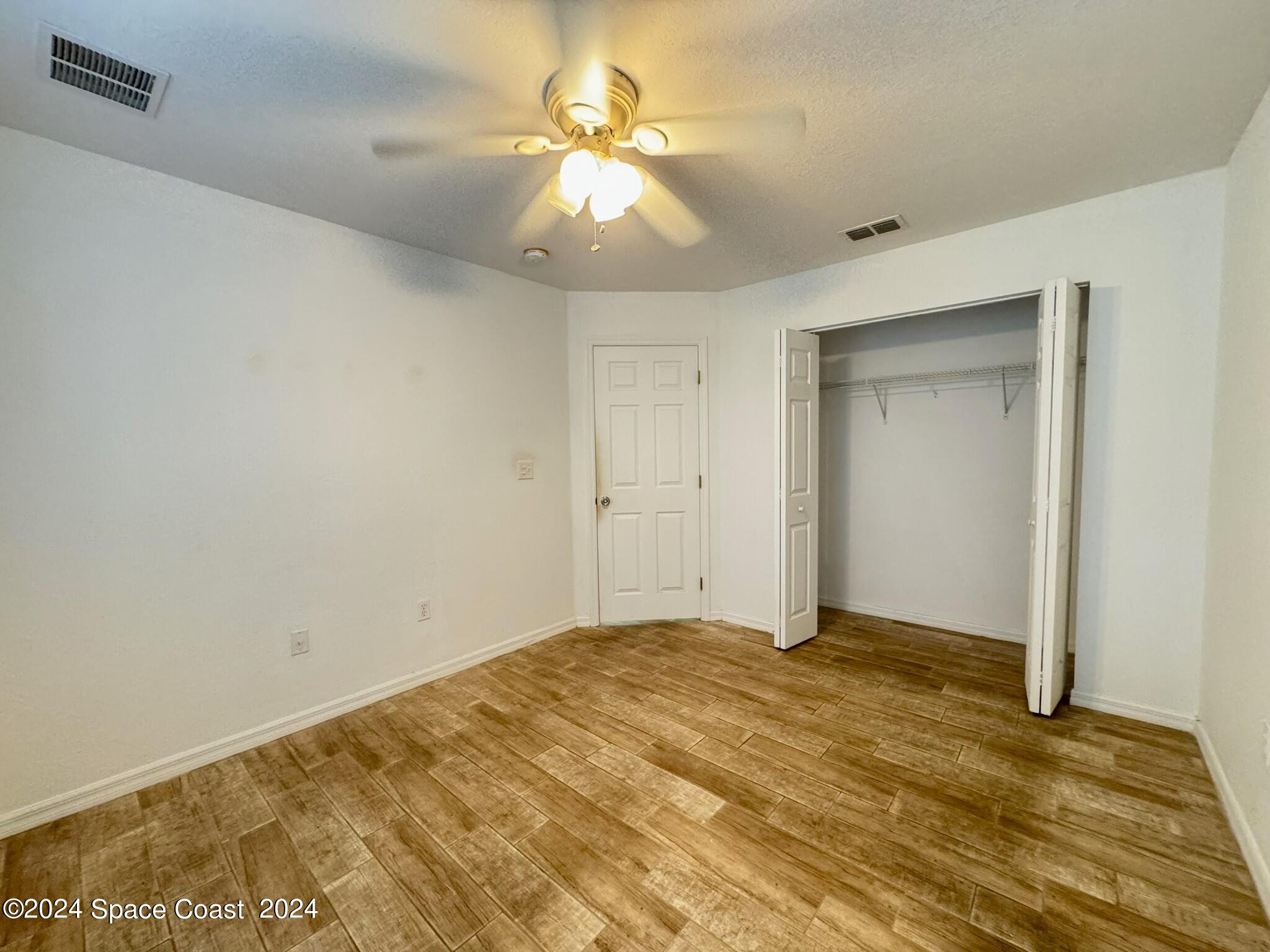 3975 Almeida Court, Unit 105 Melbourne, FL 32901 - Photo 12 of 18 a view of an empty room