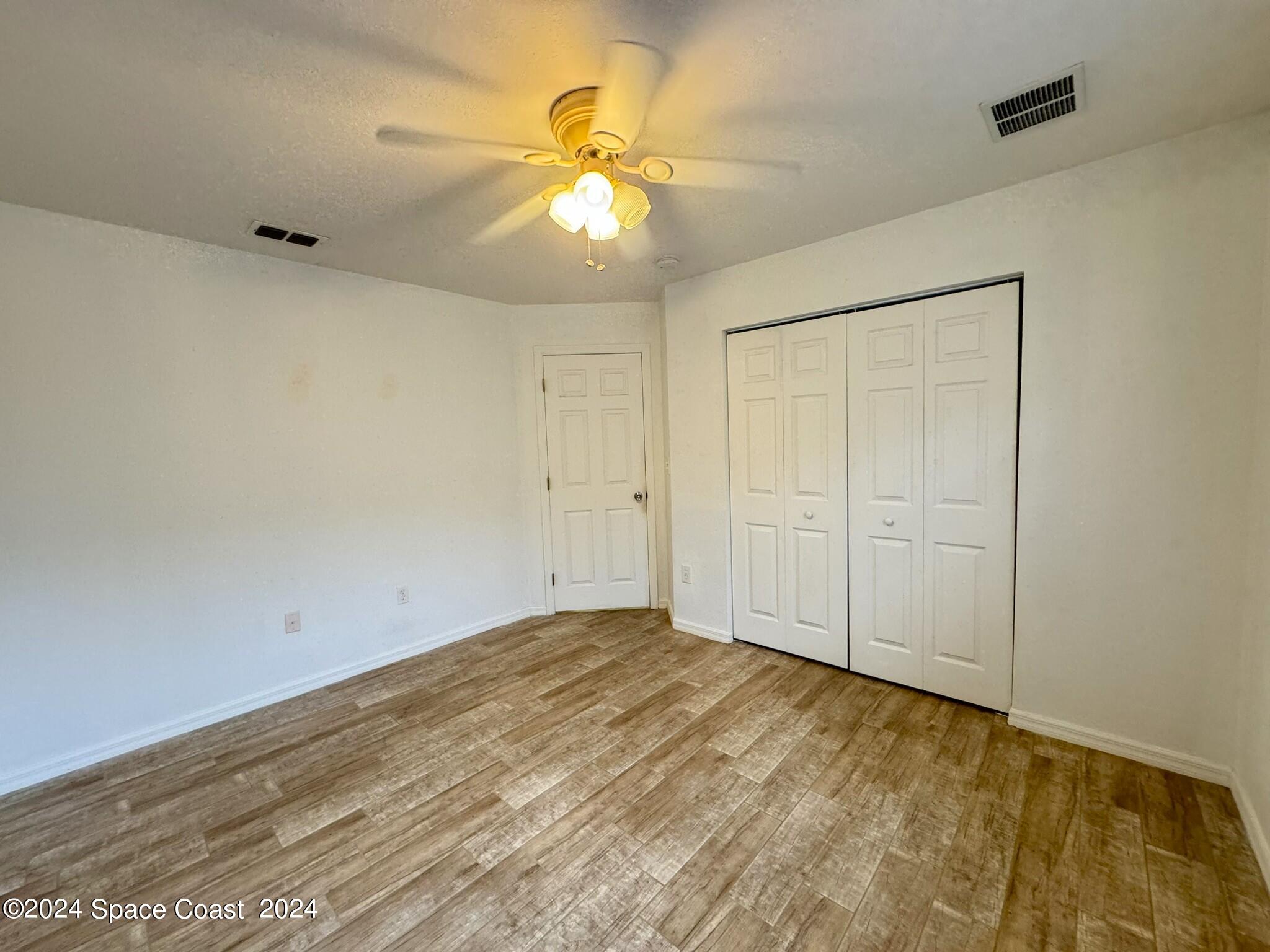 3975 Almeida Court, Unit 105 Melbourne, FL 32901 - Photo 10 of 18 a view of an empty room