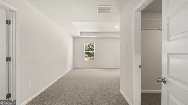 a view of a porch with yard and mountain view in front of it