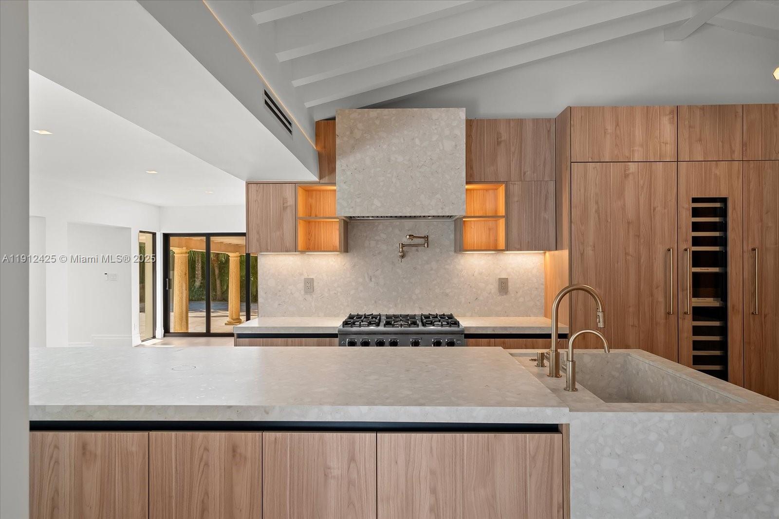 325 Gulf Road Key Biscayne, FL 33149 - Photo 12 of 51 a bathroom with a sink and a mirror