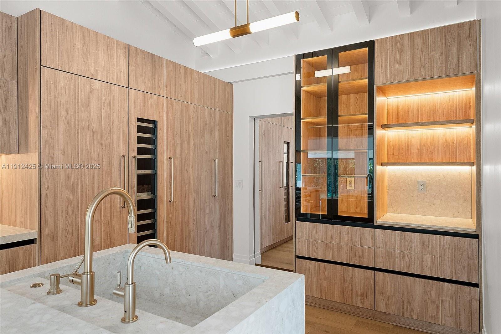 325 Gulf Road Key Biscayne, FL 33149 - Photo 13 of 51 a bathroom with a shower and a sink