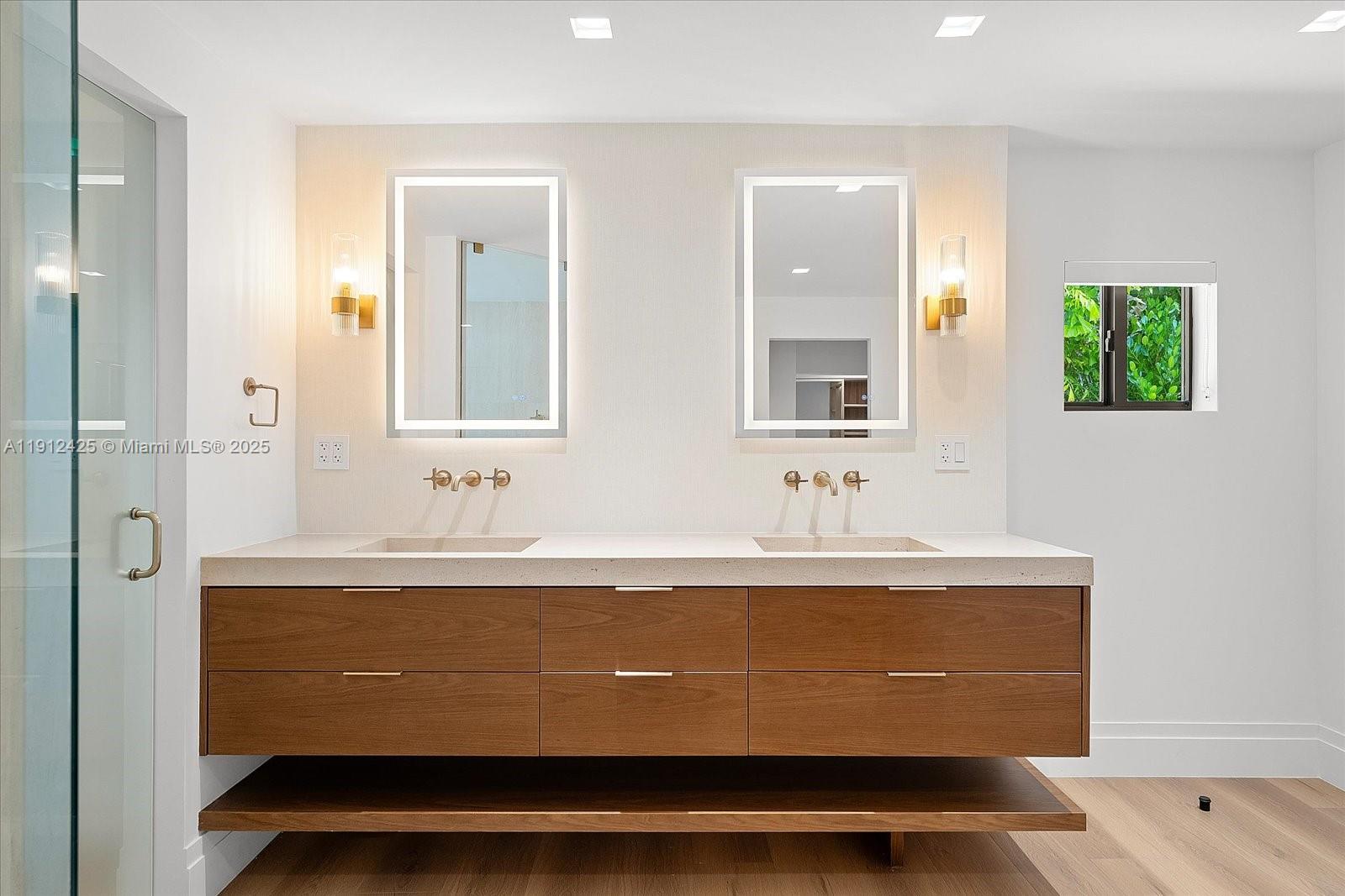 325 Gulf Road Key Biscayne, FL 33149 - Photo 22 of 51 a view of bathroom with granite countertop sink