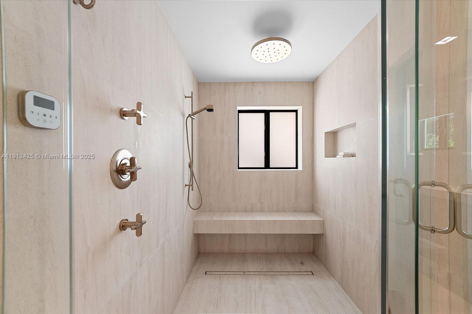 325 Gulf Road Key Biscayne, FL 33149 - Photo 23 of 51 a bathroom with a shower