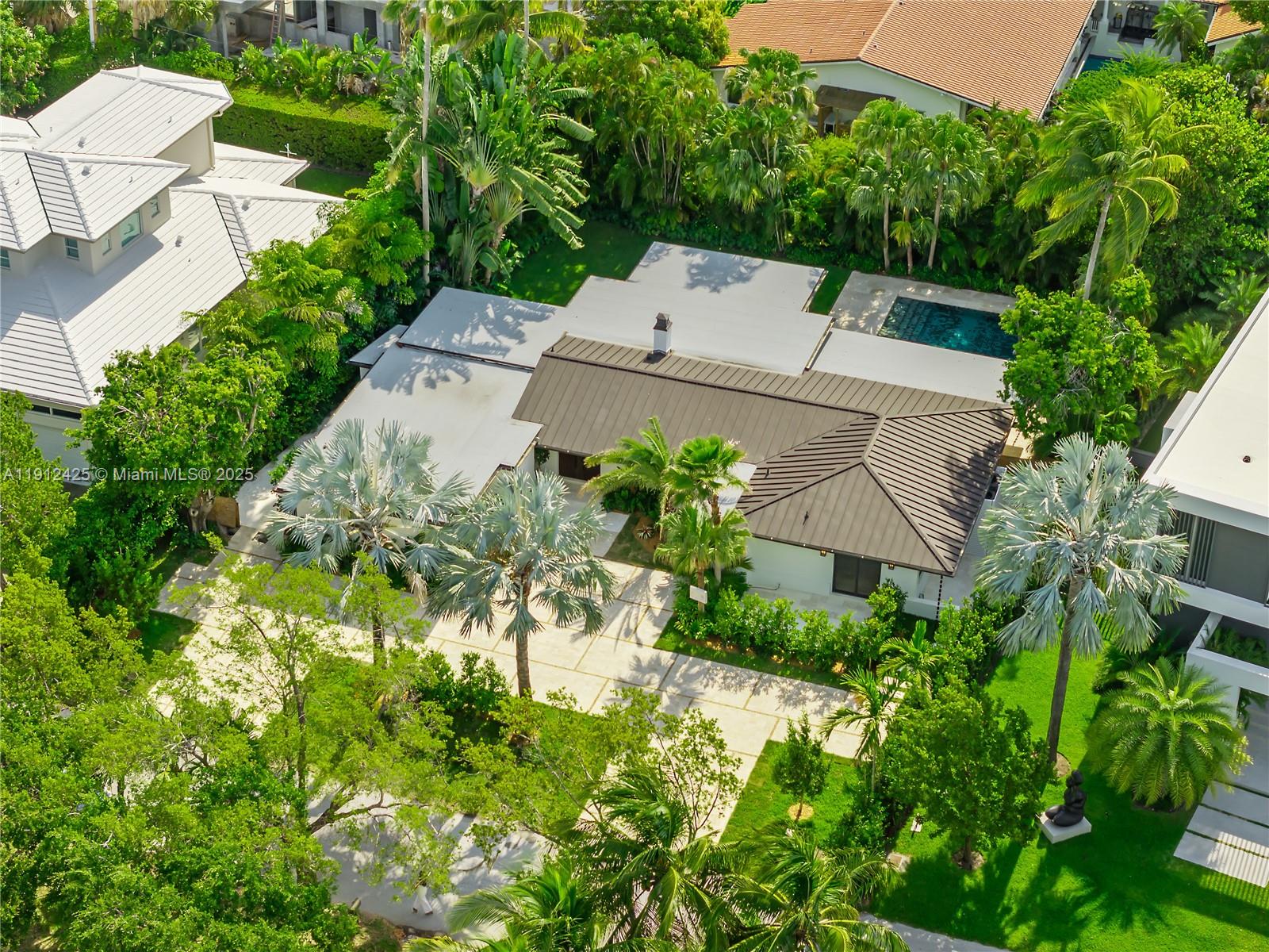 325 Gulf Road Key Biscayne, FL 33149 - Photo 48 of 51 an aerial view of a house with a yard