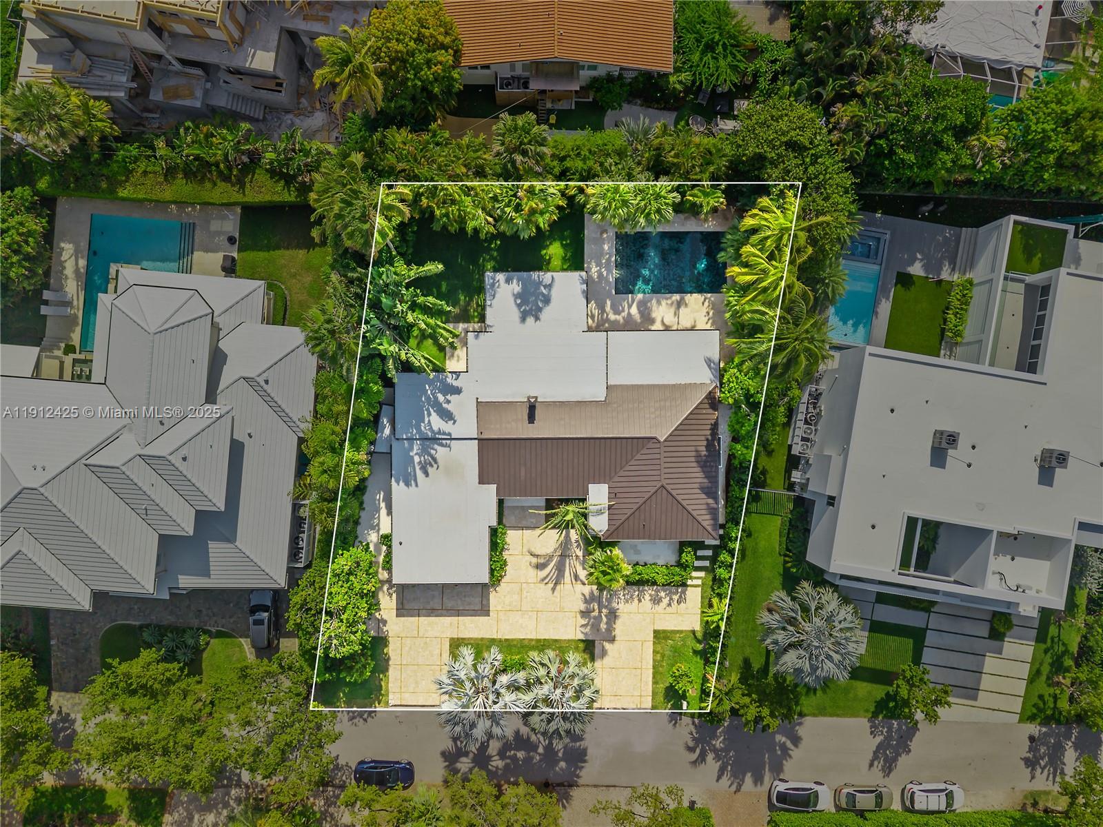 325 Gulf Road Key Biscayne, FL 33149 - Photo 49 of 51 an aerial view of a house with a garden