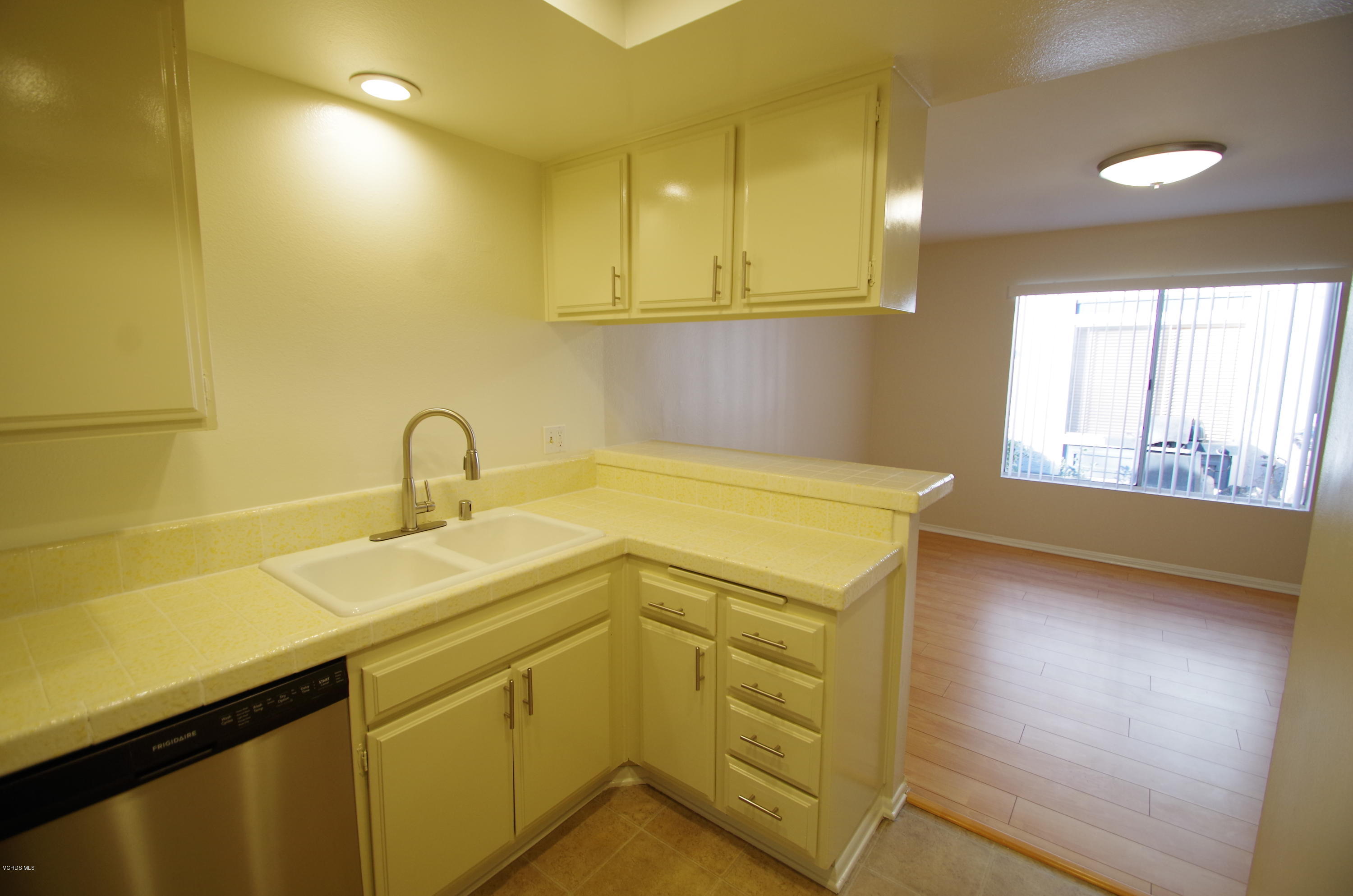 533 Spring Road, Unit 22 Moorpark, CA 93021 - Photo 7 of 20 a utility room with dryer and washer
