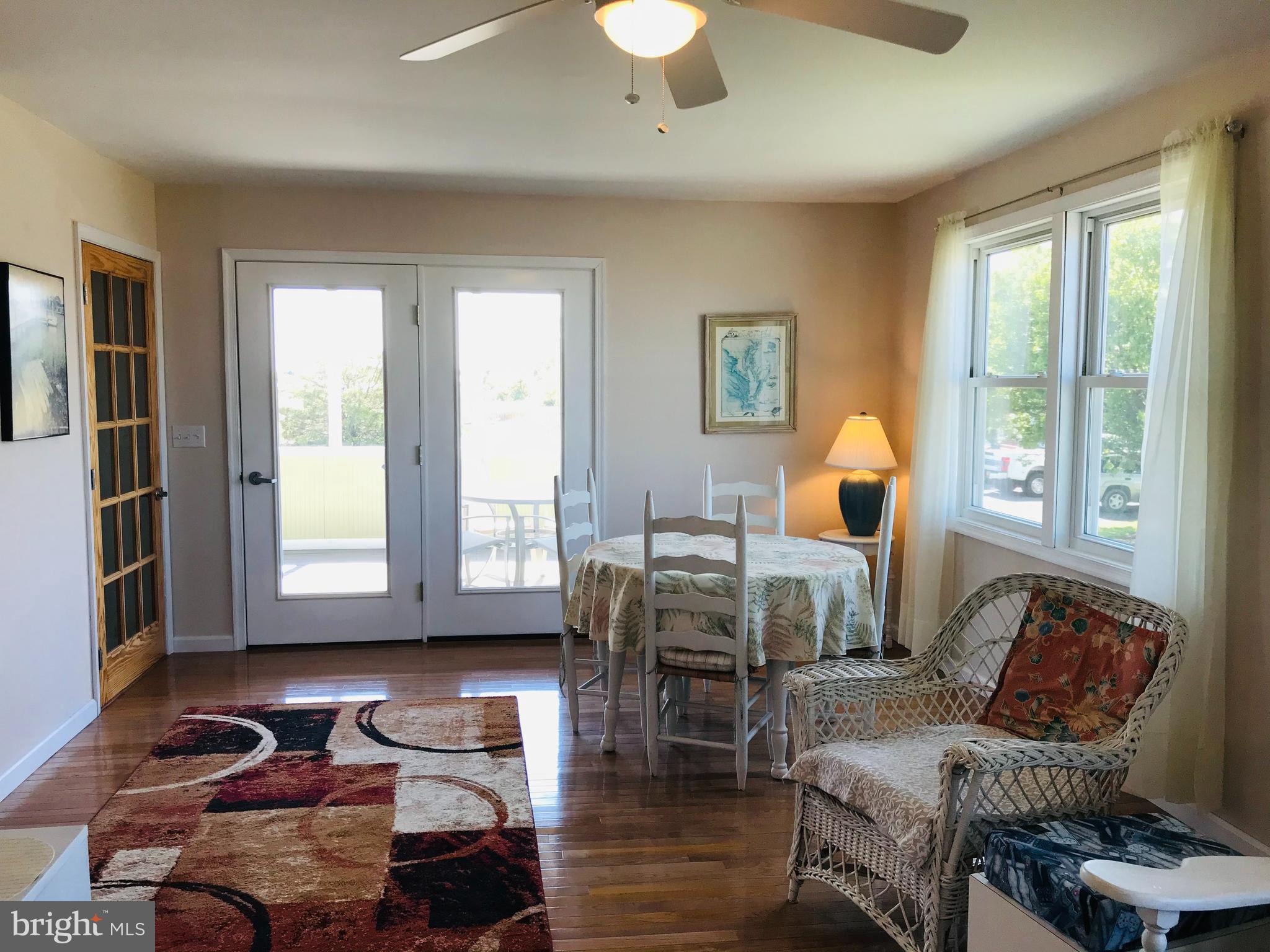 25771 Drum Point Road Westover, MD 21871 - Photo 18 of 29 Family Room to Lower Porch