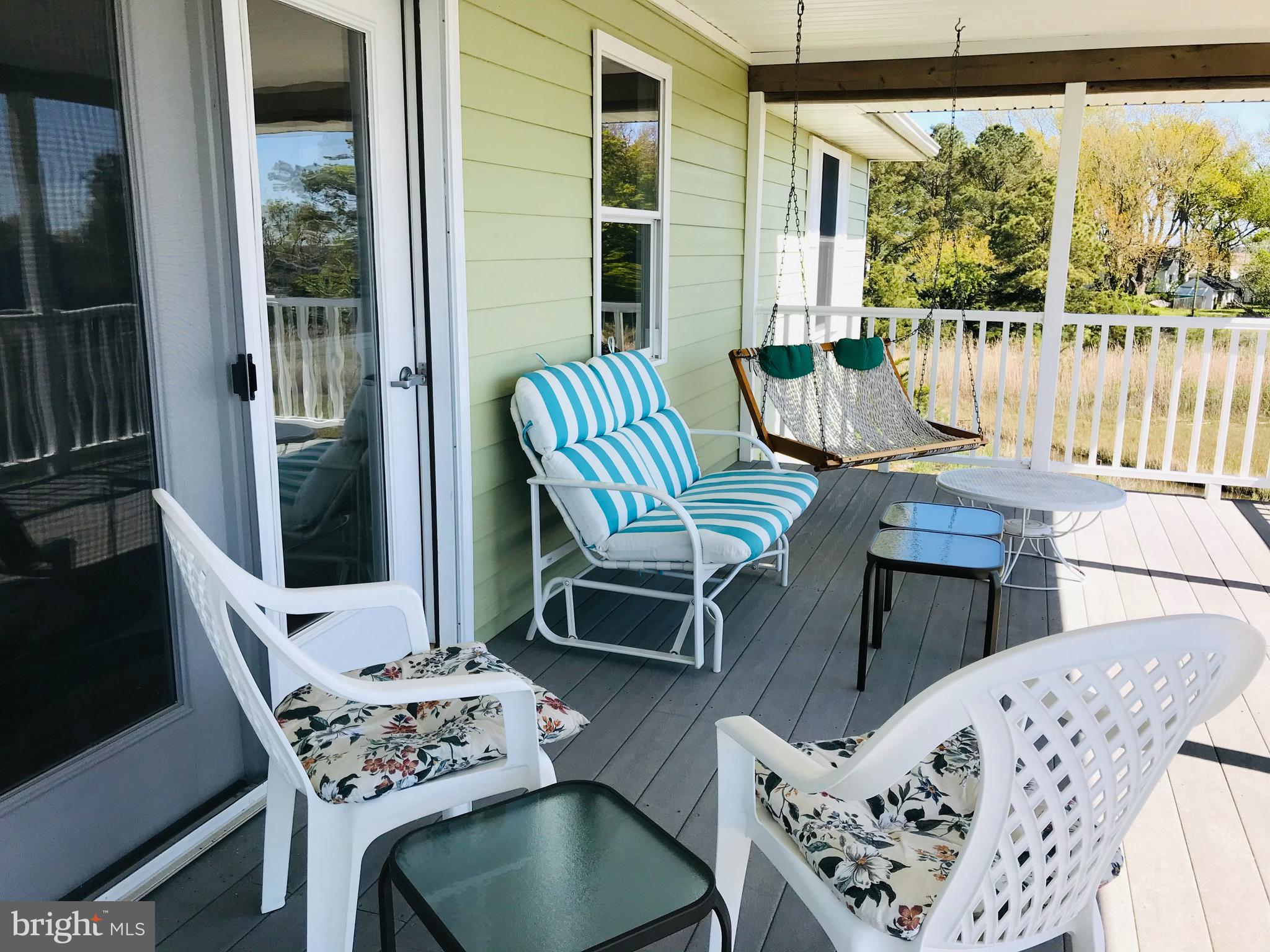 25771 Drum Point Road Westover, MD 21871 - Photo 9 of 29 24'x12' Upper Porch with Composite Floor