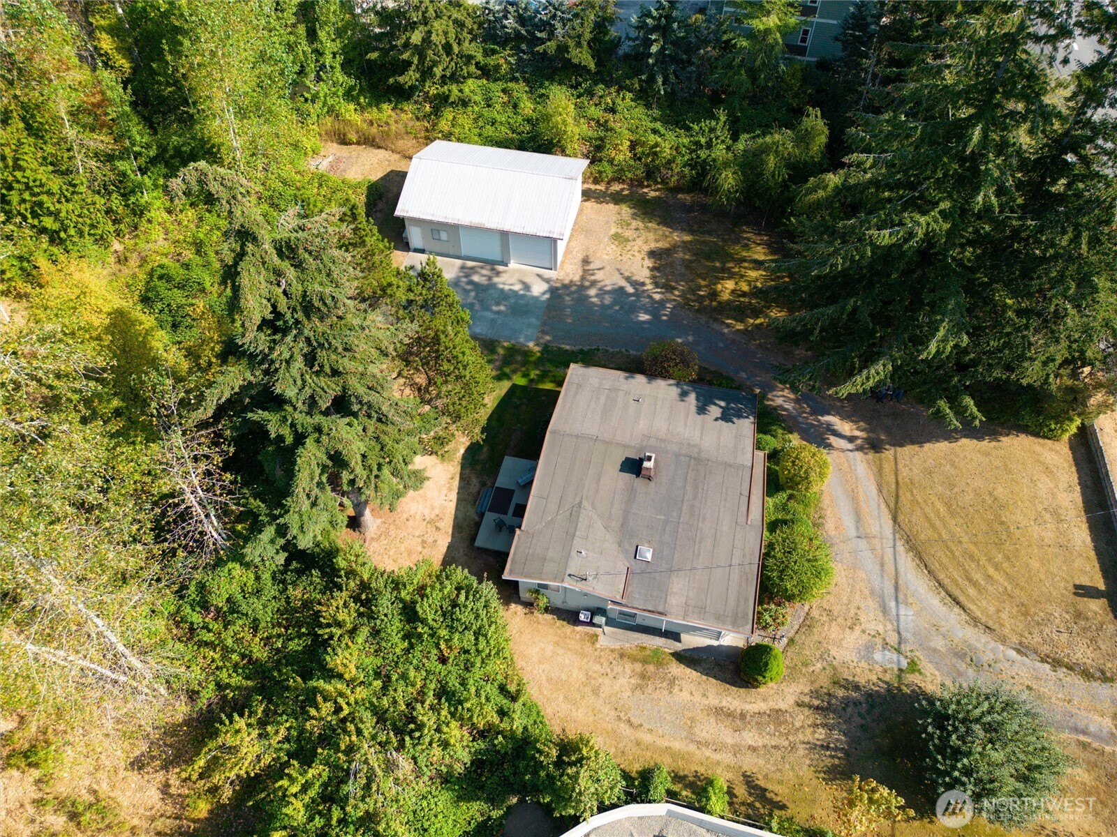 620 Telegraph Road Bellingham, WA 98226 - Photo 16 of 21 an aerial view of a house with a yard and swimming pool