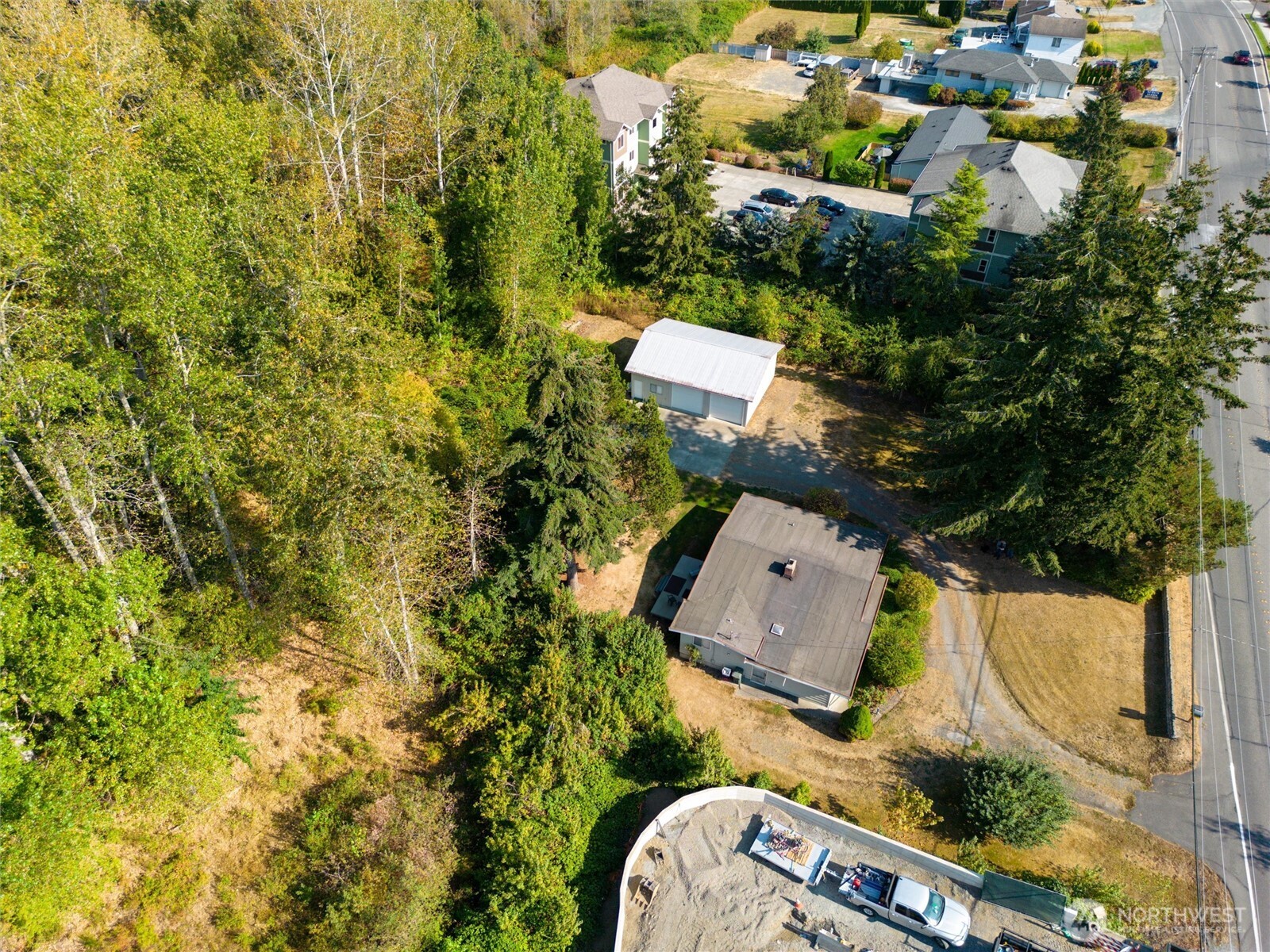620 Telegraph Road Bellingham, WA 98226 - Photo 17 of 21 an aerial view of a house with a yard and trees