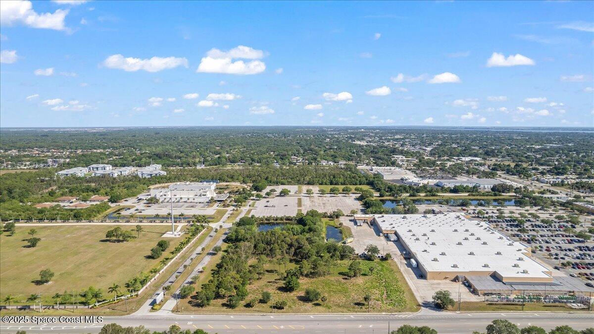 3400 Sarno Road Melbourne, FL 32935 - Photo 15 of 16 an aerial view of a city