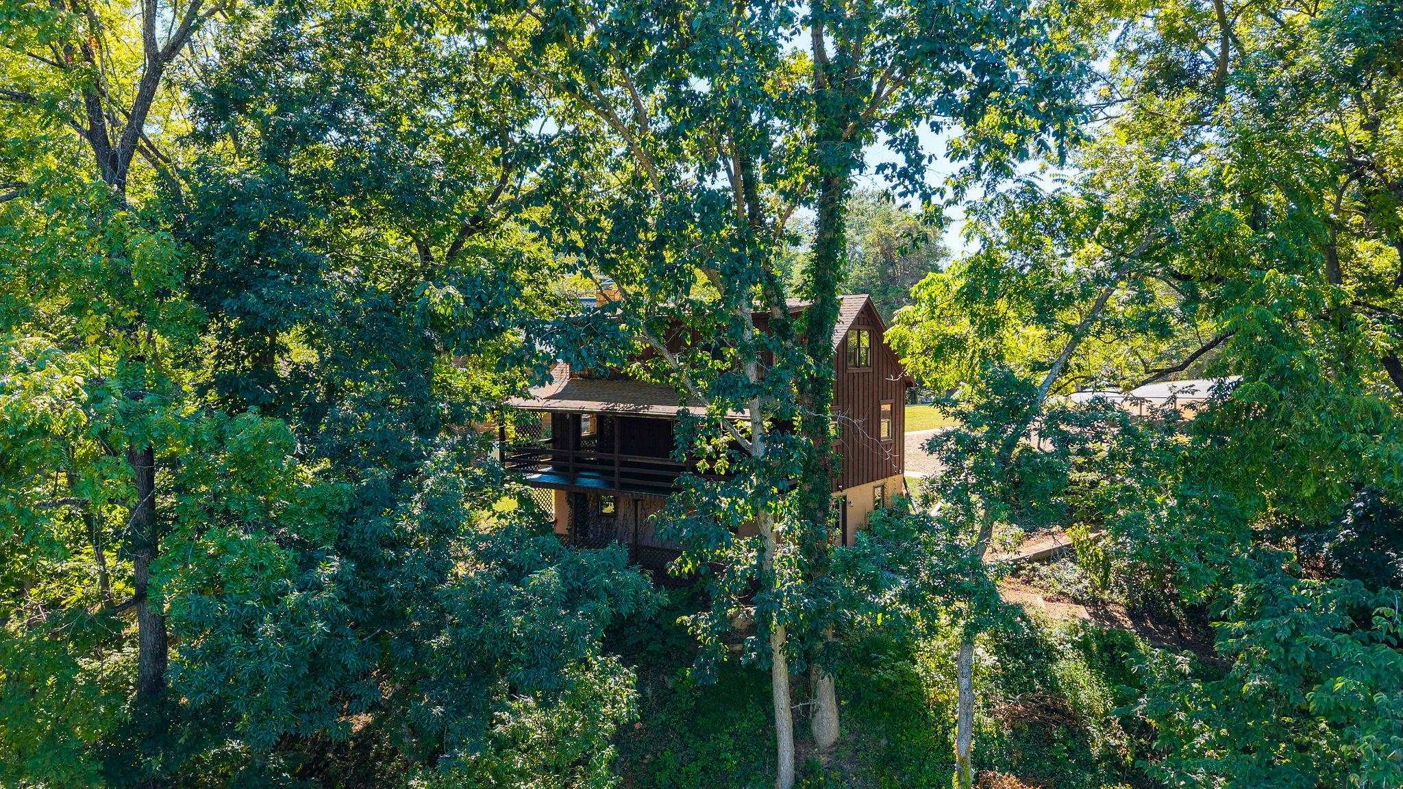 188 River Rdg Road Verona, VA 24482 - Photo 18 of 64 a backyard of a house with outdoor seating and trees