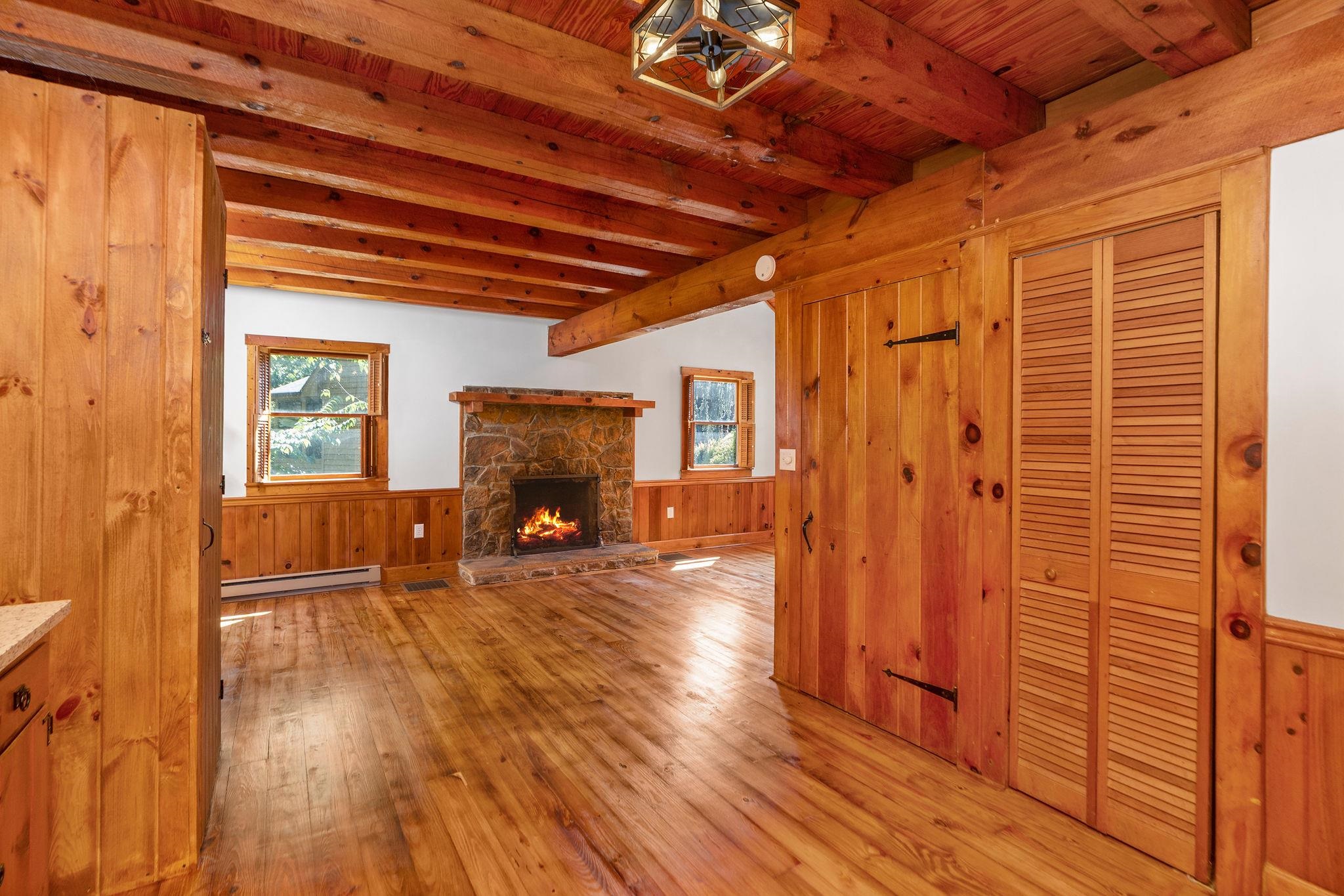 188 River Rdg Road Verona, VA 24482 - Photo 29 of 64 a view of a livingroom with wooden floor and a ceiling fan