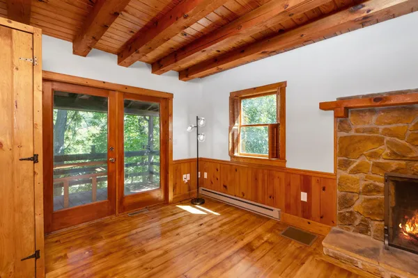 a view of balcony and wooden floor