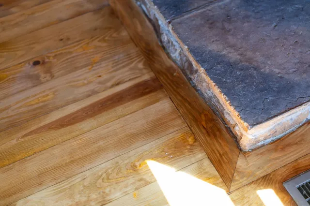 a kitchen with stainless steel appliances granite countertop a stove and a microwave