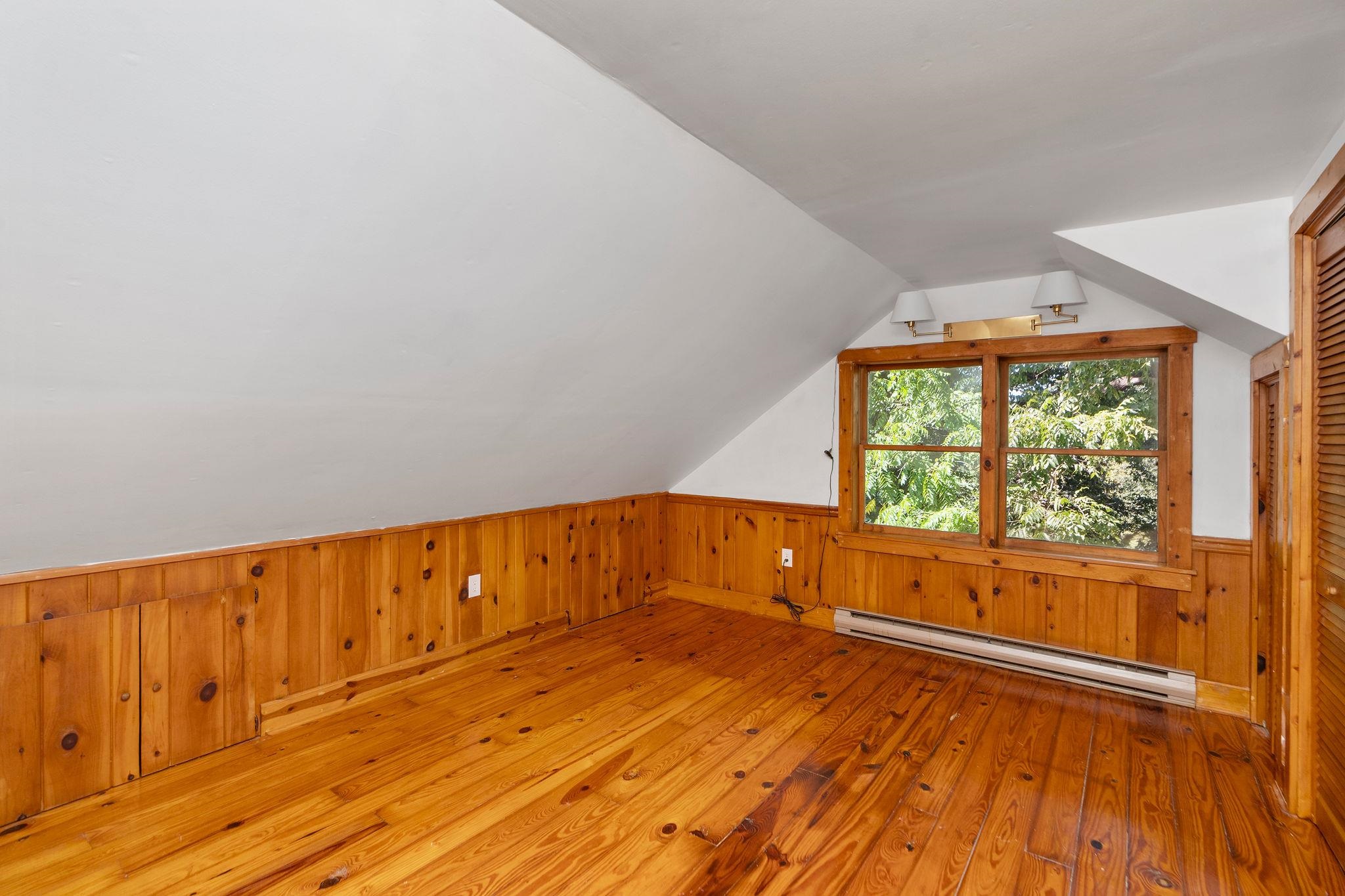 188 River Rdg Road Verona, VA 24482 - Photo 34 of 64 a view of an empty room with wooden floor and a window