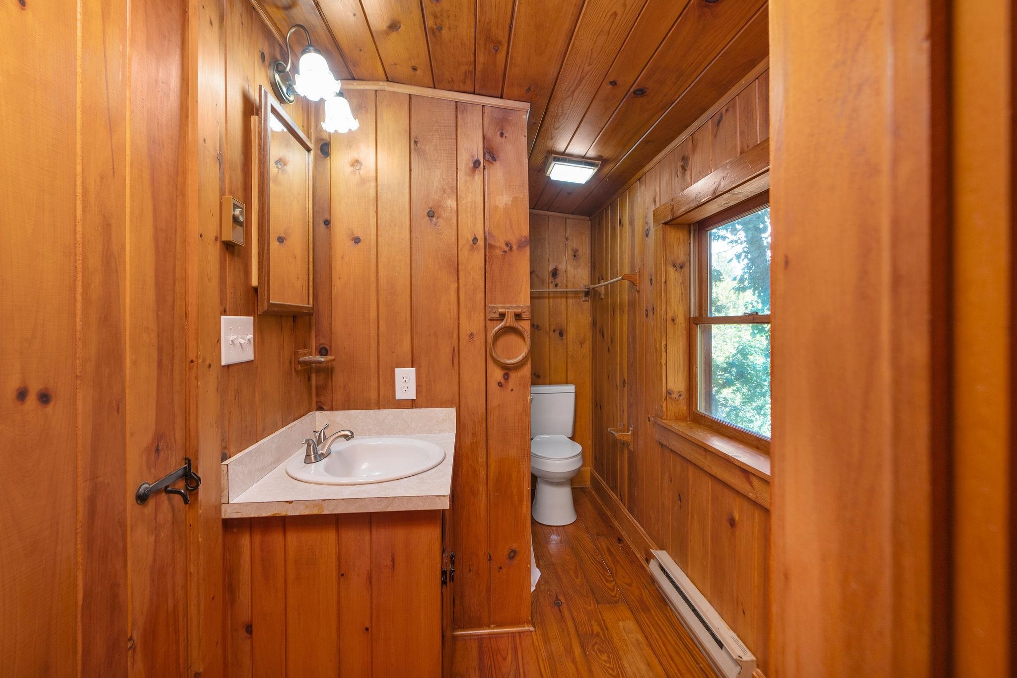 188 River Rdg Road Verona, VA 24482 - Photo 36 of 64 a bathroom with a sink a toilet and shower