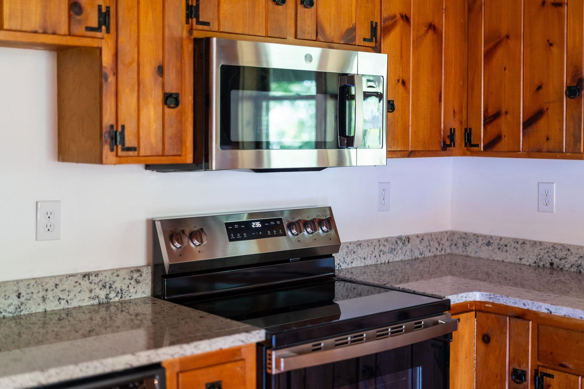 188 River Rdg Road Verona, VA 24482 - Photo 38 of 64 a kitchen with granite countertop a stove and a sink
